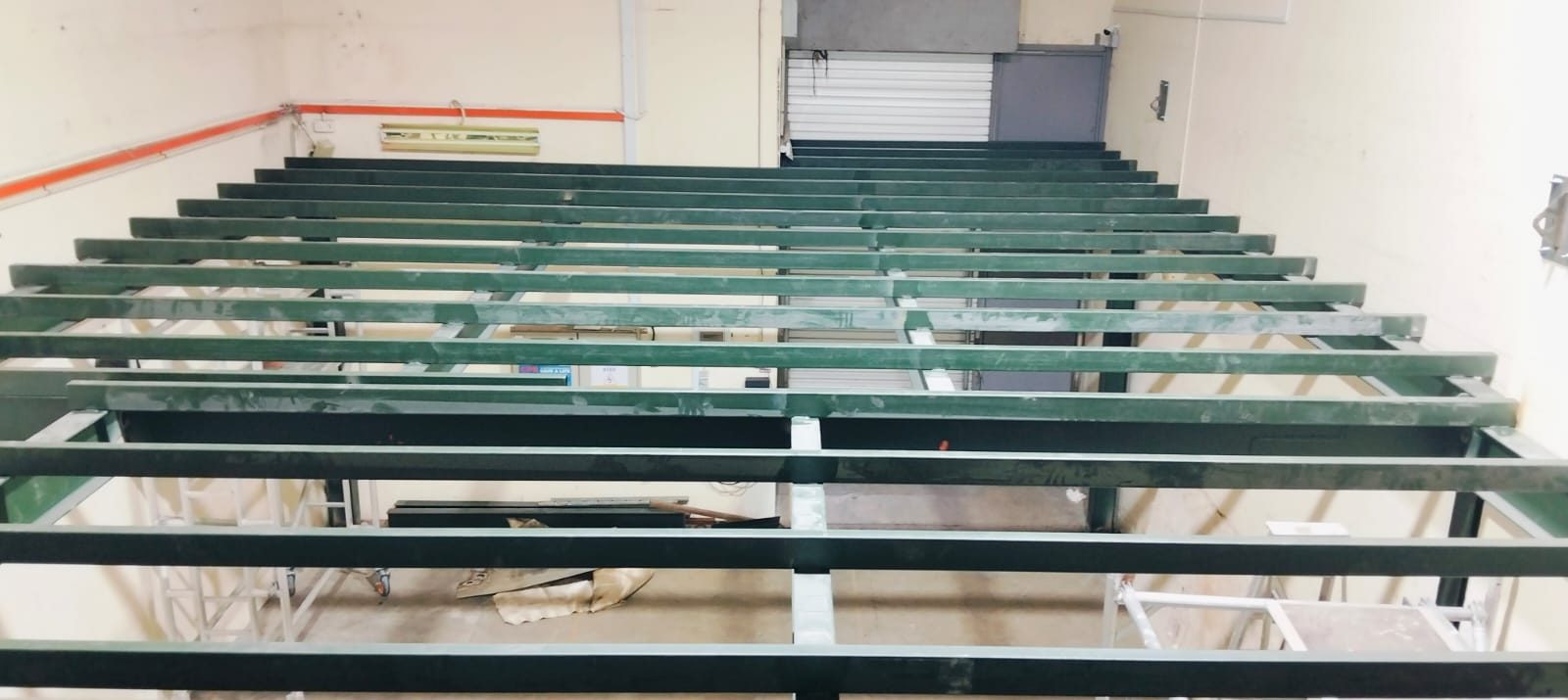 Mezzanine joists installed across the steel frame at Frontier Industrial Building before deck/floor finish